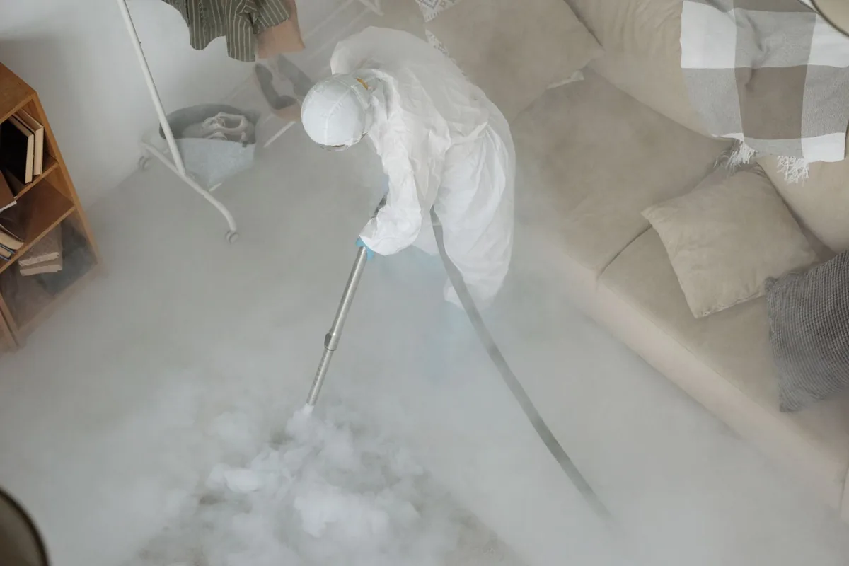 Biohazard cleanup technician in protective equipment, Westlake, FL